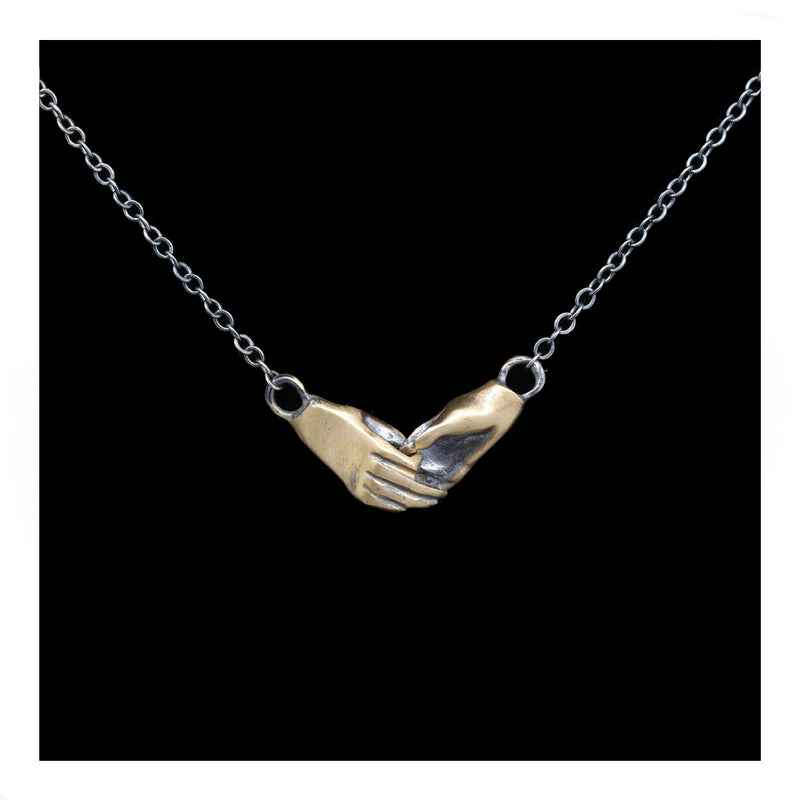 Clasping Hands Necklace